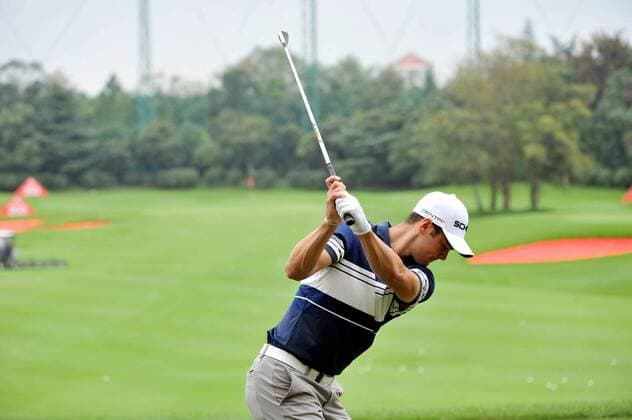 Martin Kaymer of Germany tees off in the final round of the 2011 WGC-HSBC Champions golf tournament at the Sheshan International Golf Club in Shanghai, China, 6 November 2011.  20111106_38495