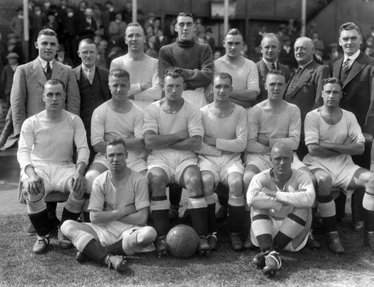 Manchester City team group 1934 35 Season Back, l-r: Fred Corbett, Director, Matt Busby, Frank Swift, Sam Barkas, Mr Wilf Wild (Manager), Director, A.Bell (trainer). Sitting: Fred Tilson, Bobby Marshall, Sam Cowan, Alex Herd, Bill Dale, Jackie Bray. Ground: Ernie Toseland and Eric Brook.  o0 sw
