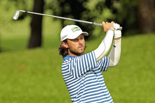 10.11.2011. Singapore. Martin Wiegele (AUT) drives his approach from the fairway of hole 4 Tanjong Course during Round 1 of the Barclays Singapore Open 2011, Sentosa Golf Club. xDanielxSweex  ActionPlus11219650 Content restricted for UK based newspaper