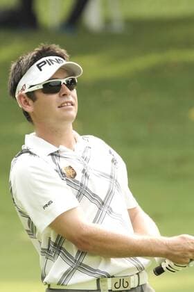 10.11.2011. Singapore. Louis Oosthuizen(RSA) observes his approach shot from the fairway of hole 10 Serapong Course during Round 1 of the Barclays Singapore Open 2011, Sentosa Golf Club. xDanielxSweex  ActionPlus11219679 Content restricted for UK based newspaper