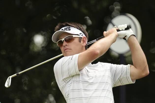 11.11.2011. Singapore. Louis Oosthuizen (RSA) tees off from hole 9 of the Tanjong Course during Round 2 of the Barclays Singapore Open 2011, Sentosa Golf Club. xDanielxSweex  ActionPlus11219822 Content restricted for UK based newspaper
