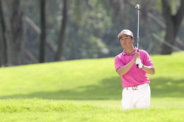11.11.2011. Singapore. Park Do-kyu (KOR) observes his approach shot from the rough of hole 7 of the Serapong Course during Round 2 of the Barclays Singapore Open 2011, Sentosa Golf Club. xDanielxSweex  ActionPlus11219827 Content restricted for UK based newspaper