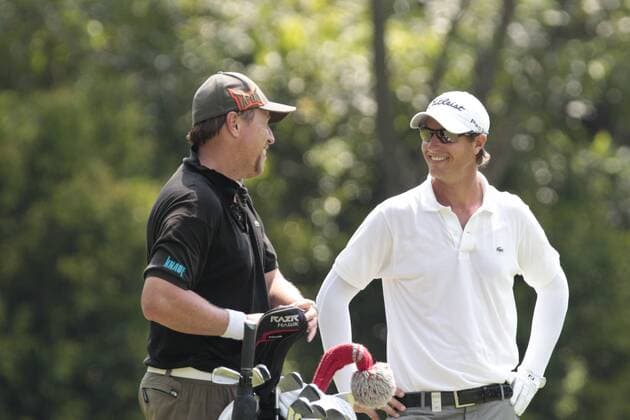 11.11.2011. Singapore. Nicolas Colsaerts (BEL) has a word with his caddie on the fairway of hole 9 of the Tanjong Course during Round 2 of the Barclays Singapore Open 2011, Sentosa Golf Club. xDanielxSweex  ActionPlus11219834 Content restricted for UK based newspaper