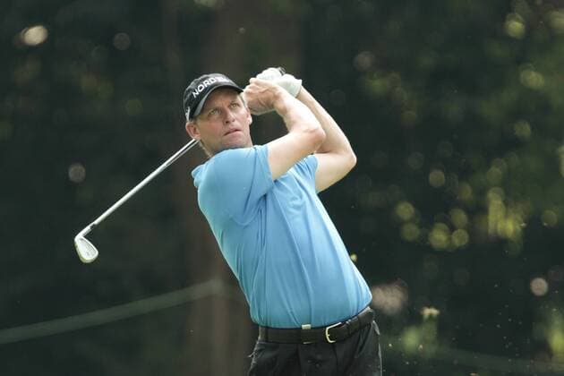 11.11.2011. Singapore. Anders Hansen (DEN) drives his approach shot from the fairway of hole 9 of the Tanjong Course during Round 2 of the Barclays Singapore Open 2011, Sentosa Golf Club. xDanielxSweex  ActionPlus11219836 Content restricted for UK based newspaper