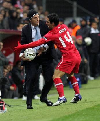 UEFA Euro 2012 play off first leg match between Turkey and Croatia ( blue)at Turk Telekom Arena Stadium in Istanbul, Turkey 11.11.2011 Match scored: Turkey 0 - Croatia 3 Pictured: Arda Turan of Turkey and Coach Slaven Bilic of Croatia. 