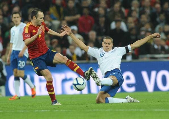 Football - International Friendly - England vs. Spain Jack Rodwell - England Andres Iniesta - Spain 