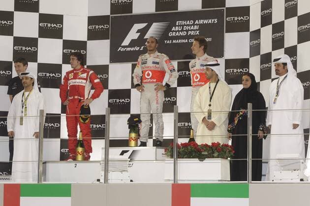 Podium: Fernando Alonso (Scuderia Ferrari), Lewis Hamilton (McLaren Mercedes), Jenson Button (McLaren Mercedes) GP Abu Dhabi 2011 Formel 1 Grand Prix Abu Dhabi 2011