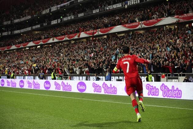Lisbon, Portugal: Cristiano Ronaldo of Portugal celebrates scoring his second goal during the Portugal and Bosnia, EURO 2012 qualifier, play off second leg match at the Estadio da Luz, on November 15, 2011 - PHOTO HELENA PONCINI IMAGO LATINPHOTO  HP003