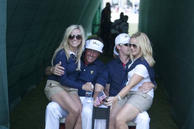 17 November 2011 : Phil Mickelson with wife Amy and Hunter Mahan and girlfriend Kandi Harris are driven away to the club house during the 1st day Foursomes Matches at the Presidents Cup at the Royal Melbourne Golf Club in Melbourne, Australia. PGA Golf Herren NOV 17 Presidents Cup - Day 1 Foursomes matches Icon111117091 o0 Familie EDITORIAL USE ONLY