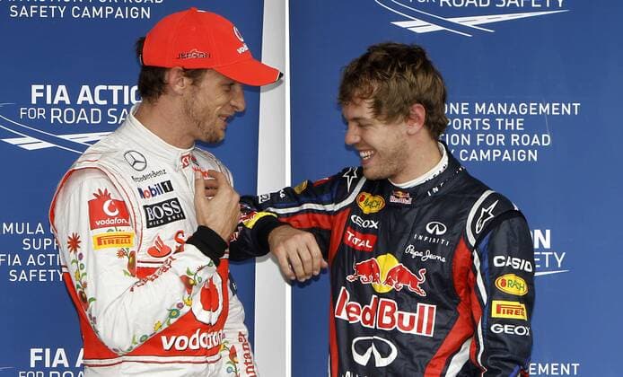 Motorsports: FIA Formula One World Championship 2011, Grand Prix of Brazil, 04 Jenson Button (GBR, Vodafone McLaren Mercedes), 01 Sebastian Vettel (GER, Red Bull Racing), xHOCHxZWEIx