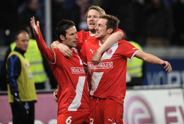 05-12-2011, Fussball, Saison 2011-2012, 2. Bundesliga, 17. Spieltag, MSV DUISBURG - FORTUNA DÜSSELDORF (v.li.) Jens Langeneke (Fortuna Düsseldorf), Sascha Rösler (Fortuna Düsseldorf) und Adam Bodzek (Fortuna Düsseldorf) feiern den ersten Treffer