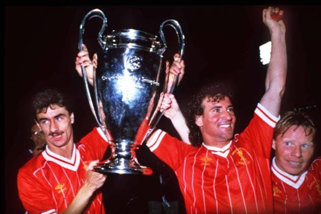 Football Craig Johnston,Ian Rush and Sammy Lee parade the European Cup trophy. Liverpool v Roma. European Cup Final 1984. 