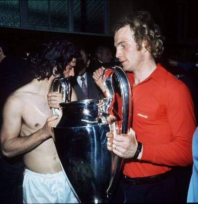 Uli Hoeneß and Gerd Müller (Bayern Munich) with the tyrophy. European Cup Final REPLAY. Bayern Munich v Atletico Madrid. 1974. 