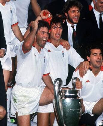 Carlo Ancelotti and Paolo Maldini (Milan) with the trophy. AC Milan v Benfica, Vienna; European Cup Final; 23 05 1990 Football 