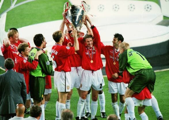 Ole Solskjaer, scorer of the winner for United, celebrates with the trophy. Manchester United v Bayern Munich, Champions League Cup Final; 26 05 1999; Barcelona. 