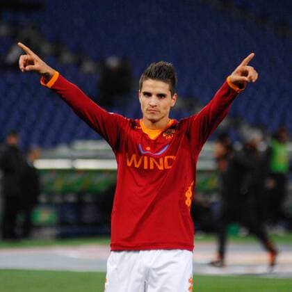 11.01.2012. Rome, Italy. COPPA ITALIA 2011 2012 ROMA versus FIORENTINA. ERIK LAMELA gives the victory salute sign to his fans in the crowd. xKEYPRESSMEDIAx  ActionPlus11232818