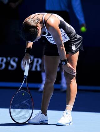 United Kingdom s Heather Watson reacts as losing a point during the 1st round of women s singles match on day 1 of 2012 Australian Open tennis tournament at Melbourne Park 