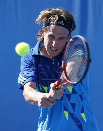 Australian Open 2012, Melbourne Park,ITF Grand Slam Tennis Tournament,Peter Gojowczyk (GER), Aktion,Einzelbild,Halbkoerper,Hochformat,