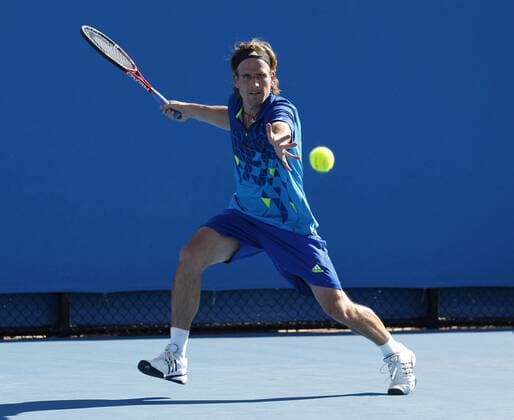 Australian Open 2012, Melbourne Park,ITF Grand Slam Tennis Tournament,Peter Gojowczyk (GER), Aktion,Einzelbild,Ganzkoerper,Querformat,