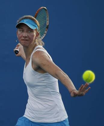 Australian Open 2012, Melbourne Park,ITF Grand Slam Tennis Tournament,Mona Barthel (GER) Aktion,Einzelbild,Halbkoerper,Hochformat,