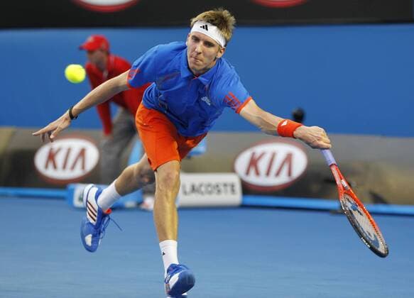 Australian Open 2012, Melbourne Park,ITF Grand Slam Tennis Tournament,Cedrik-Marcel Stebe (GER),Aktion,Einzelbild,Ganzkörper,Querformat,