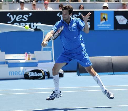 Australian Open 2012, Melbourne Park,ITF Grand Slam Tennis Tournament .Philipp Petzschner (GER),Aktion,Einzelbild,Ganzkoerper,Querformat,