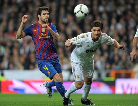 FUSSBALL INTERNATIONAL Copa del Rey 1 4 FINALE 2011 2012 18.01.2012 Real Madrid - FC Barcelona Cesc Fabregas (li, Barca) gegen Xabi Alonso (Real Madrid) 