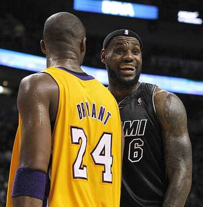 Jan. 19, 2012 - Miami, FL, USA - The Miami Heat s LeBron James, right, with Los Angles Lakers Kobe Bryant in the second quarter at the American Airlines Arena in Miami, Florida, on Thursday, January 19, 2012. The Heat held off the Lakers, 98-87. Los Angeles Lakers at Miami Heat - ZUMAm67