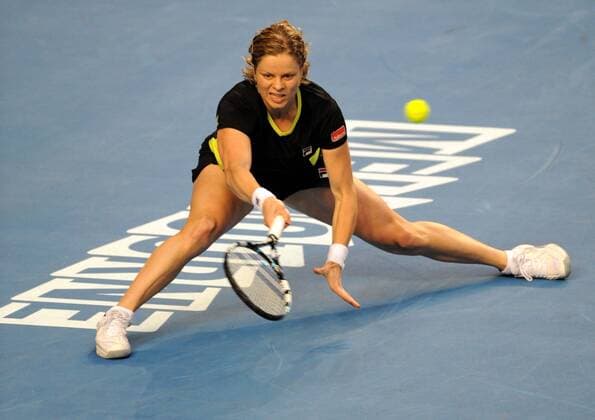 MELBOURNE, Jan. 20, 2012 -- Kim Clijsters of Belgium hits a return in her third round during women s singles match at 2012 Australian Open tennis championship in Melbourne, Australia, Jan. 20, 2012. 