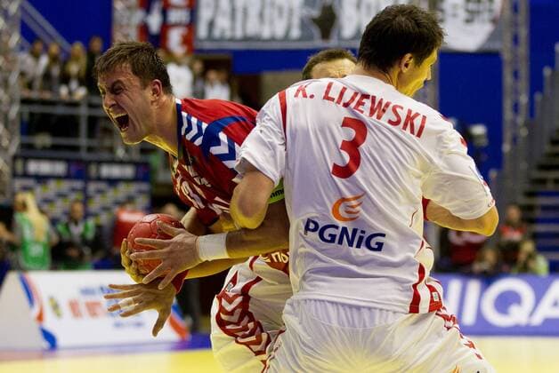 Handball: EHF Handball EURO 2012 Serbia, Poland - Serbia, Momir Ilic of Serbia vs Krzysztof Lijewski of Poland during handball match between Poland and Serbia in Preliminary Round of 10th EHF European Handball Championship Serbia 2012, on January 15, 2012 in Arena Pionir, Belgrade, Serbia. 