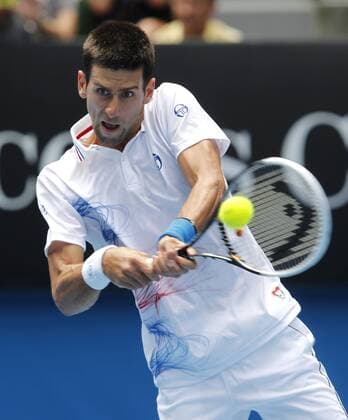 Australian Open 2012, Melbourne Park,ITF Grand Slam Tennis Tournament ,Novak Djokovic (SRB),Aktion,Einzelbild,Halbkoerper,Hochformat,