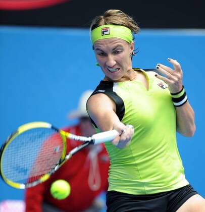 MELBOURNE, Jan. 21, 2012 -- Svetlana Kuznetsova of Russia hits a return during the women s singles third round match at the 2012 Australian Open tennis tournament in Melbourne, Australia, Jan. 21, 2012. 