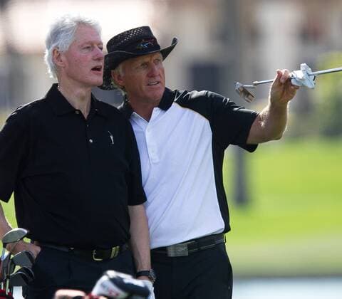 Jan. 21, 2012 - La Quinta, California, U.S - Former U.S. President Bill Clinton (left) and pro golfer Greg Norman (right) plays at the Humana Challenge held at PGA Golf Herren West Palmer Private course in La Quinta on January 21, 2012. Humana Challenge - Round 3 - ZUMAx54