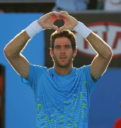 Australian Open 2012, Melbourne Park,ITF Grand Slam Tennis Tournament,Juan Martin Del Potro(ARG) jubelt auf besondere Art nach seinem Sieg, er macht eine Herzform mit seinen Händen, Einzelbild,Halbkoerper,Hochformat,