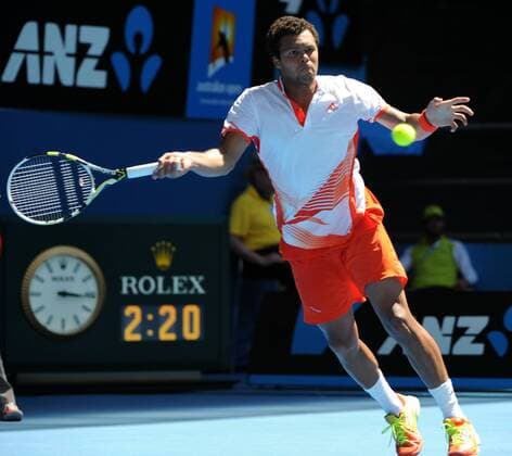 (120123) -- MELBOURNE, Jan. 23, 2012 (Xinhua) -- Jo-Wilfried Tsonga of France returns the ball during the fourth round match of men s singles Japan at the Australian Open tennis tournament in Melbourne, Jan. 23, 2012. . (Xinhua Guo Yong)(wll) AUSTRALIA- MELBOURNE-TENNIS-AUSTRALIAN OPEN-DAY 8 