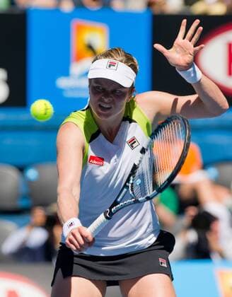 (120124) -- MELBOURNE, Jan. 24, 2012 (Xinhua) -- Kim Clijsters of Belgium hits a return during the women s singles quarterfinal match at the 2012 Australian Open tennis tournament in Melbourne, Australia, Jan. 24, 2012. Clijsters won 2-0. (Xinhua Bai Xue) (jyc) AUSTRALIA-MELBOURNE-TENNIS-AUSTRALIAN OPEN-WOMEN S SINGLES 