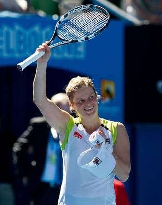 (120124) -- MELBOURNE, Jan. 24, 2012 (Xinhua) -- Kim Clijsters of Belgium greets spectators after the women s singles quarterfinal match at the 2012 Australian Open tennis tournament in Melbourne, Australia, Jan. 24, 2012. Clijsters won 2-0. (Xinhua Bai Xue) (jyc) AUSTRALIA-MELBOURNE-TENNIS-AUSTRALIAN OPEN-WOMEN S SINGLES 