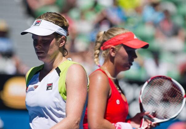 (120124) -- MELBOURNE, Jan. 24, 2012 (Xinhua) -- Caroline Wozniacki of Denmark and Kim Clijsters of Belgium react during their women s singles quarterfinal match at the 2012 Australian Open tennis tournament in Melbourne, Australia, Jan. 24, 2012. Clijsters won 2-0. (Xinhua Bai Xue) (jyc) AUSTRALIA-MELBOURNE-TENNIS-AUSTRALIAN OPEN-WOMEN S SINGLES 