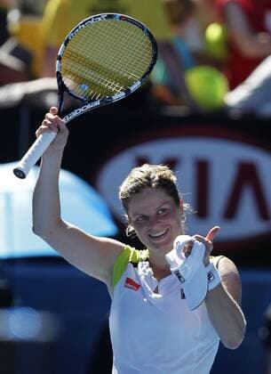 Australian Open 2012, Melbourne Park,ITF Grand Slam Tennis Tournament, Kim Clijster (BEL) winkt mit dem Schlaeger und bedankt sich beim Publikum, Emotion,Einzelbild,Halbkoerper,Hochformat,