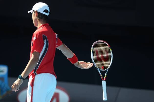 Kei Nishikori, JAP, throwing away his racquet in the quarter final of 2012 Tennis Australian Open in Melbourne, 25 01 2012 -
