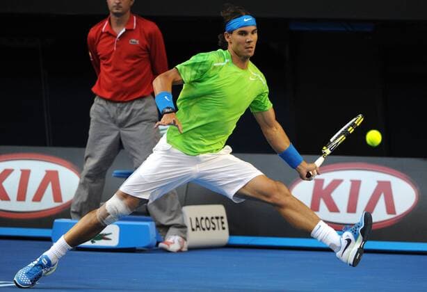 MELBOURNE, Jan. 29, 2012 -- Rafael Nadal of Spain hits a return during their men s singles final at 2012 Australian Open tennis tournament in Melbourne on Jan. 29, 2012. (Xinhua Guo Yong) AUSTRALIA-MELBOURNE-TENNIS-MEN S-FINAL 