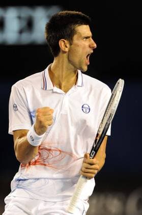 (120129) -- MELBOURNE, Jan. 29, 2012 (Xinhua) -- Novak Djokovic of Serbia celebrates after winning a point during the men s singles final at 2012 Australian Open tennis tournament in Melbourne, Australia, on Jan. 29, 2012. (Xinhua Guo Yong) (hy) AUSTRALIA-MELBOURNE-TENNIS-MEN S-FINAL 
