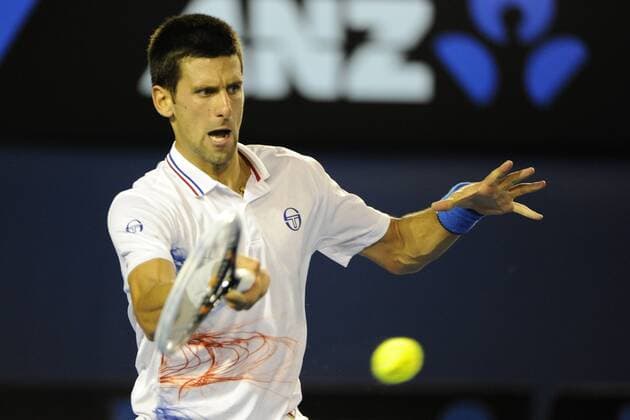 29.01.2012 Australian Open Tennis Mens Final from Melbourne Park. Novak Djokovic (SRB) returns a shot in his match on the fourteenth day of the Australian Open Tennis Championships in Melbourne, Australia. xEstherxLimx  ActionPlus20144476