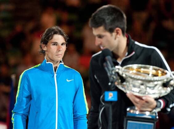 (120129) -- MELBOURNE, Jan. 29, 2012 (Xinhua) -- Novak Djokovic (front) of Serbia and Rafael Nadal of Spain are seen during the awarding ceremony for their men s singles final at 2012 Australian Open tennis tournament in Melbourne, Australia, on Jan. 29, 2012. (Xinhua Bai Xue) (hy) AUSTRALIA-MELBOURNE-TENNIS-MEN S-FINAL 