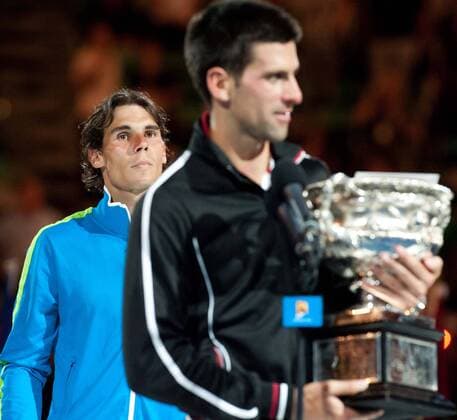 (120129) -- MELBOURNE, Jan. 29, 2012 (Xinhua) -- Novak Djokovic (front) of Serbia and Rafael Nadal of Spain are seen during the awarding ceremony for their men s singles final at 2012 Australian Open tennis tournament in Melbourne, Australia, on Jan. 29, 2012. (Xinhua Bai Xue) (hy) AUSTRALIA-MELBOURNE-TENNIS-MEN S-FINAL 