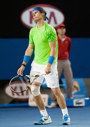 (120129) -- MELBOURNE, Jan. 29, 2012 (Xinhua) -- Rafael Nadal of Spain reacts during the men s singles final at 2012 Australian Open tennis tournament in Melbourne, Australia, on Jan. 29, 2012. (Xinhua Bai Xue) (fmh) AUSTRALIA-MELBOURNE-TENNIS-MEN S-FINAL 