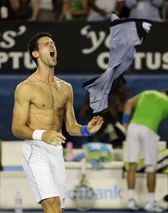 Australian Open 2012, Melbourne Park,ITF Grand Slam Tennis Tournament, Novak Djokovic (SRB) jubelt mit nacktem Oberkörper und wirft sein Hemd in die Luft,Jubel, Emotion,Einzelbild,Halbkörper,Hochformat