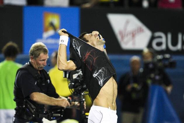 29 January 2012 : Novak Djokovic (SRB) in his final match against Rafael Nadal (ESP) rips his shirt after winning the epic 5 set grandslam final during Day 14 of the Mens final of the Australian Tennis open grand slam event at Melbourne Park, Melbourne Australia. TENNIS: JAN 29 Australian Open - Men s Final Icon12012928 EDITORIAL USE ONLY