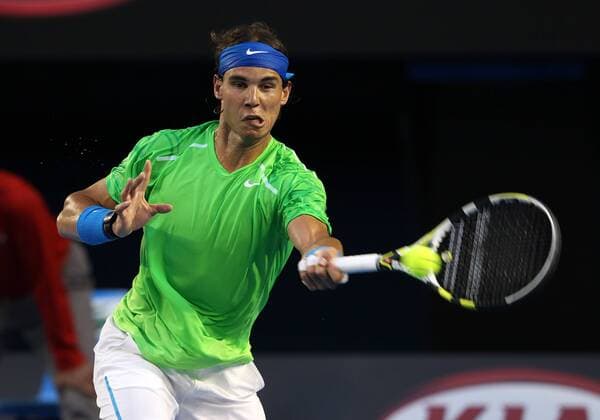 January 29, 2012: Rafael Nadal (ESP) hits a forehand during the finals of the Australian Open at Melbourne Park Tennis Centre in Melbourne, Australia. TENNIS: JAN 29 Australian Open - Men s Final Icon120129002 EDITORIAL USE ONLY