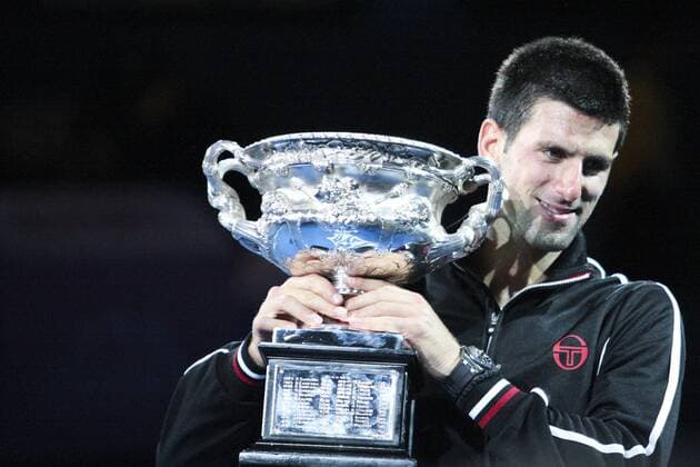 29 January 2012 : Novak Djokovic (SRB) in his final match against Rafael Nadal (ESP) lifts the winners trophy during Day 14 of the Mens final of the Australian Tennis open grand slam event at Melbourne Park, Melbourne Australia. TENNIS: JAN 29 Australian Open - Men s Final Icon12012941 EDITORIAL USE ONLY